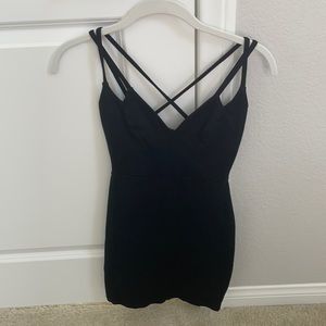 Black mini dress with strap crossing